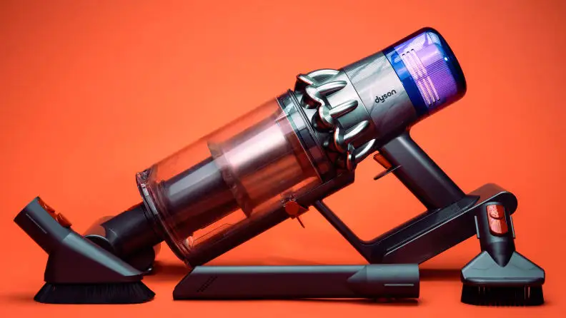A vacuum cleaner against an orange background
