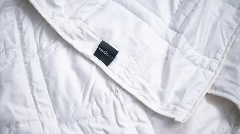 shot of the blanket and its brand tag