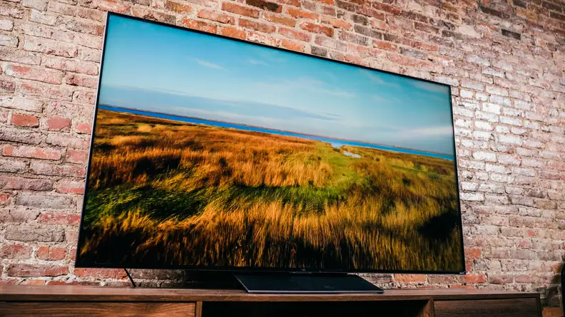 The TCL 6-Series 8K displaying high-resolution content in a living room setting