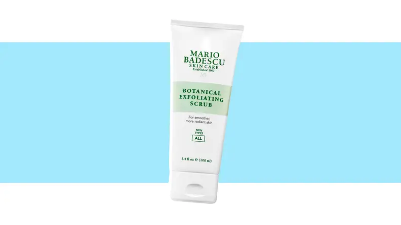 A tube of exfoliating scrub against a blue background.