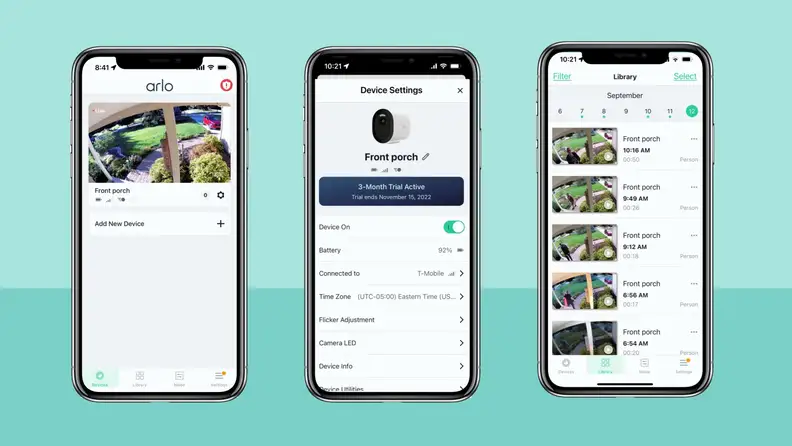 Three phones with the Arlo app on display.