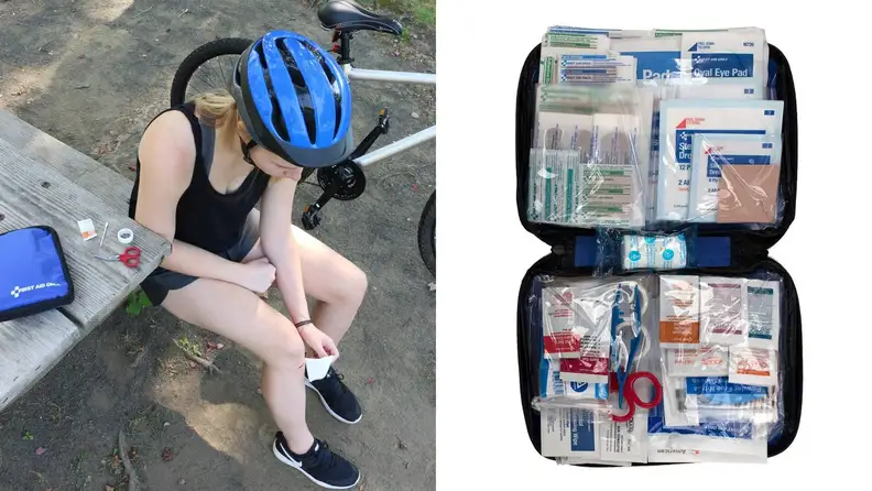 A person uses a first aid kit to relieve a wound.