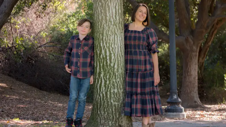 The author and her son are photographed wearing matching plaid outfits.