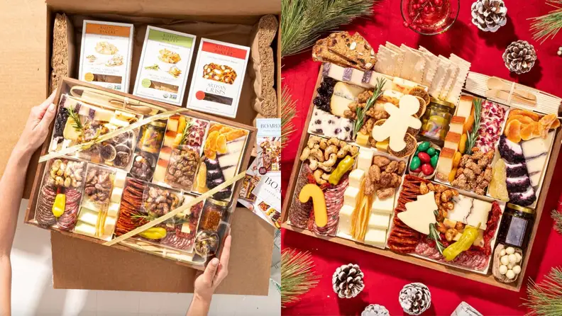 Two pre-packaged charcuterie boards filled with artesan cheeses and snacks.