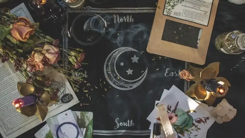 Roses, candles, and mystical items