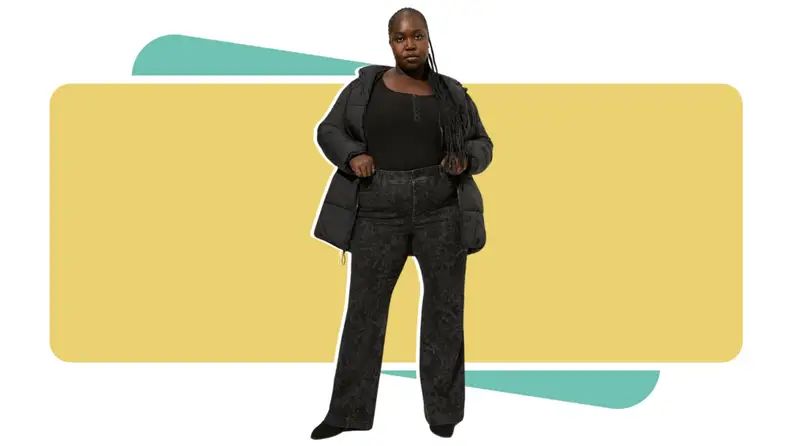 A woman wearing Torrid jeans.
