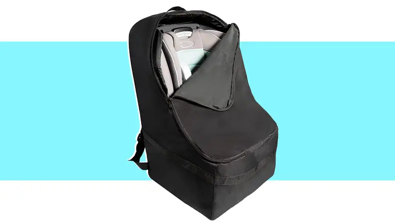 A car seat in a travel bag on a light blue background