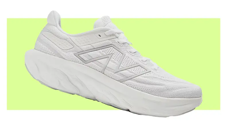 White Fresh Foam X 1080v13 sneakers on a colorful background