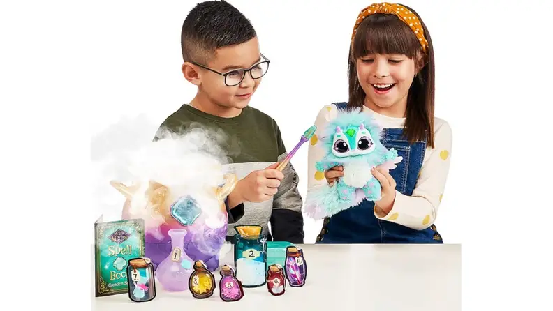 Two children playing with stuffed dolls together.