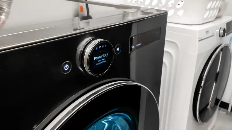 The The LG DLEX6700B has a circular dial with an LED display on it.