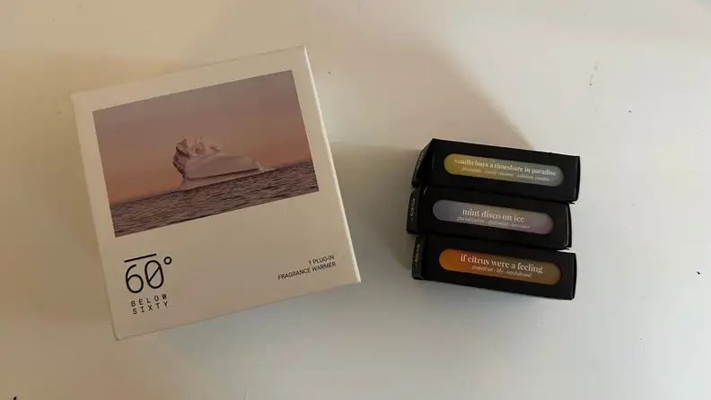 On the left, the box for the Below 60 diffuser next to the three fragrances offered.