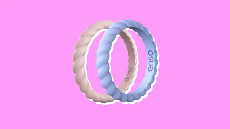 Two Enso Silicone Rings on a purple background.