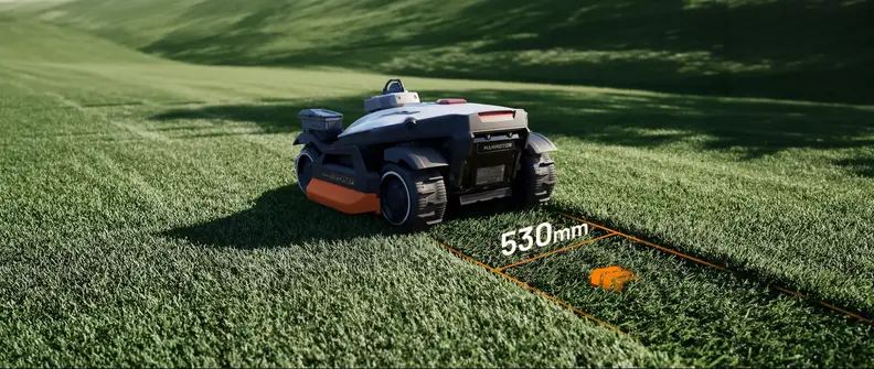 MAMMOTION LUBA 4 AWD on a lawn with a 530mm cutting-width diagram marked on the grass.