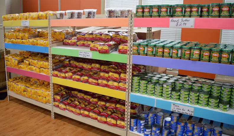In addition to produce and prepped meals, staples like organic bread and all natural peanut butter are on display.