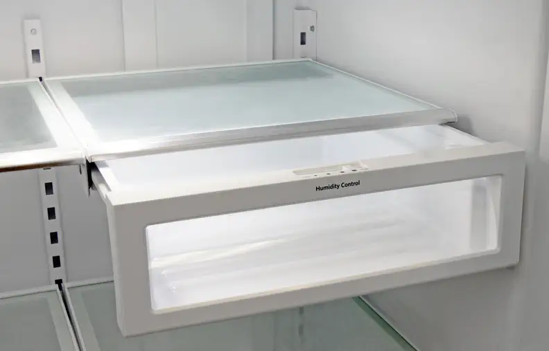 The KitchenAid KFXS25RYMS's lone crisper is found attached to the bottom of an adjustable shelf.