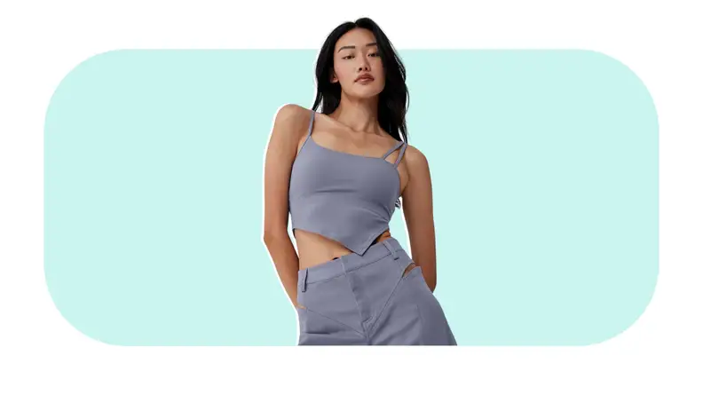 Model showcasing a gray Alo Yoga All Night Tank and matching pants.