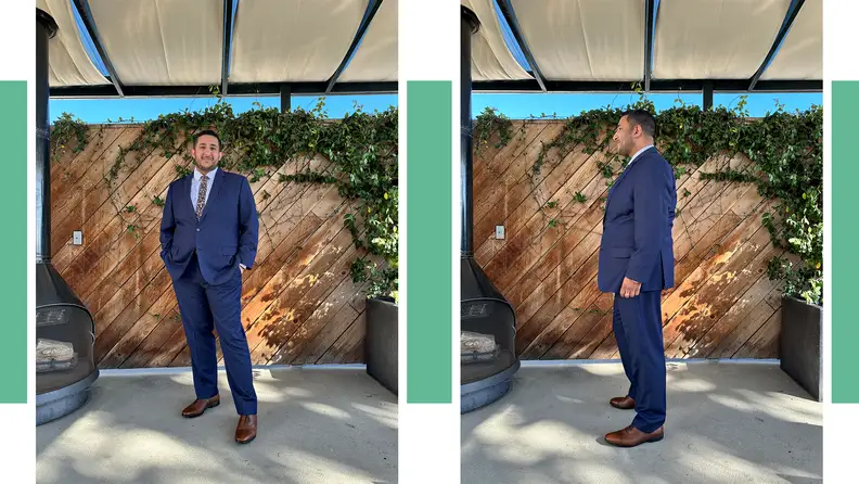 The author is seen wearing a blue suit - the suit is seen from multiple angles.