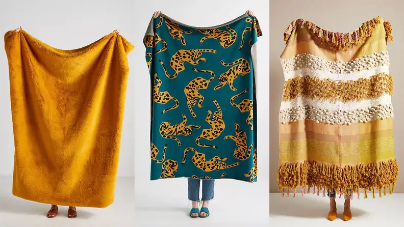 Three throw blankets, among the best things to buy at Anthropologie.