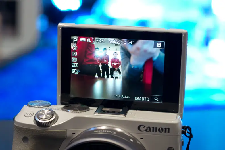 The LCD on the M3 can flip up and all the way forward to face your subject for easy selfie action.
