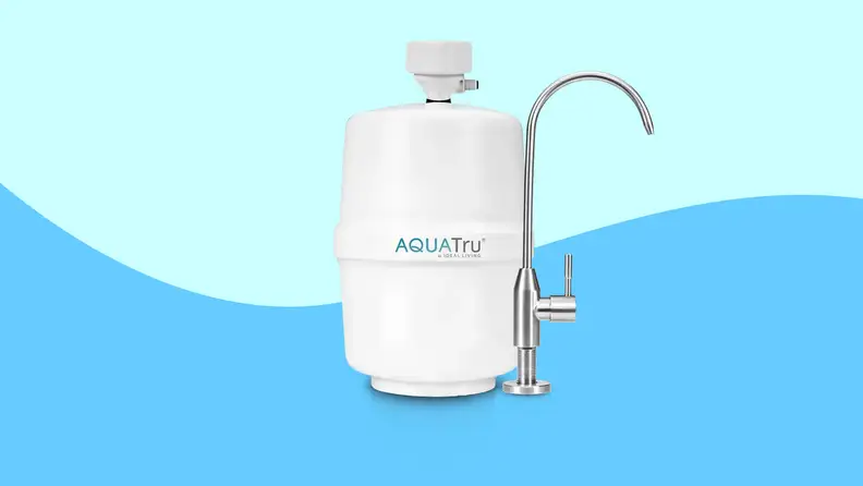 AquaTru water filter on wavy blue background