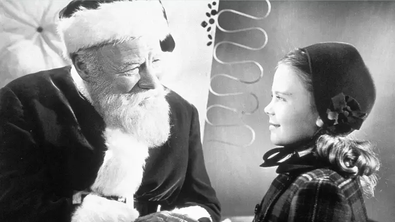 In the original 1947 Miracle on 34th Street, Santa Clause (Edmund Gwenn) inquires about the gift wishes of Susan Walker, played by a young Natalie Wood.