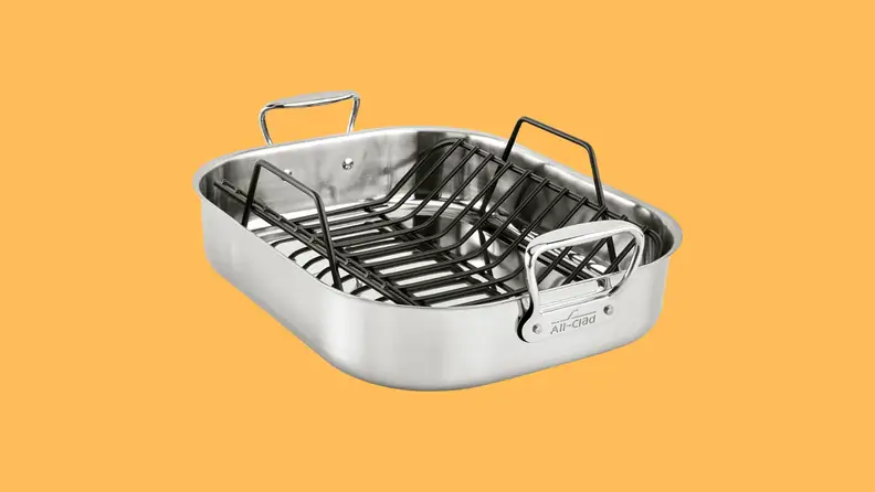 A roasting pan and rack  on yellow background