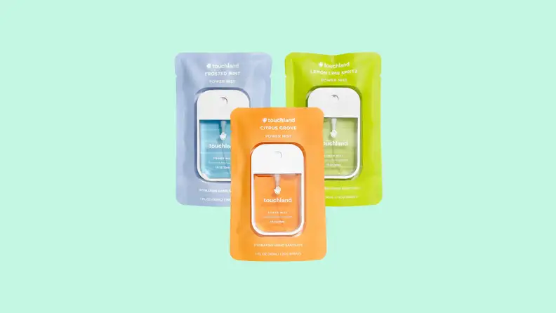 Three packets of Touchland hydrating hand sanitizer spray in three different scents: Frosted Mint, Lemon Lime Spritz, and Power Mist.