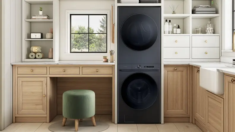 Stacked washer and dryer tower integrated into custom cabinetry.