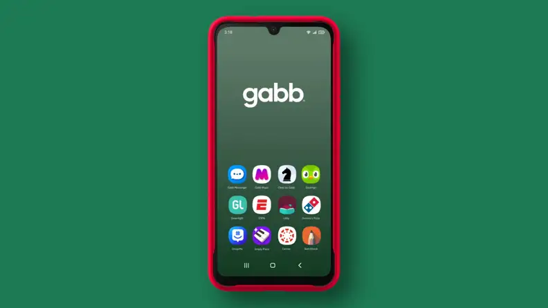 Gabb phone 4 pro in red case on green background