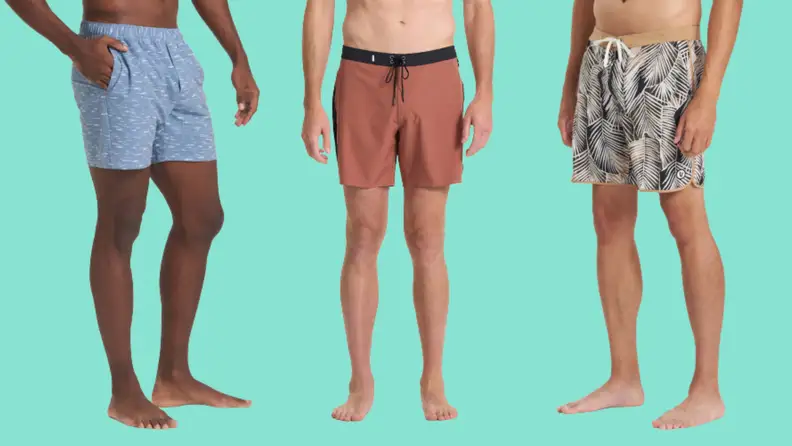 Three men's swimsuits: One in a blue print, one in a rusty red, and one in a botanical print.