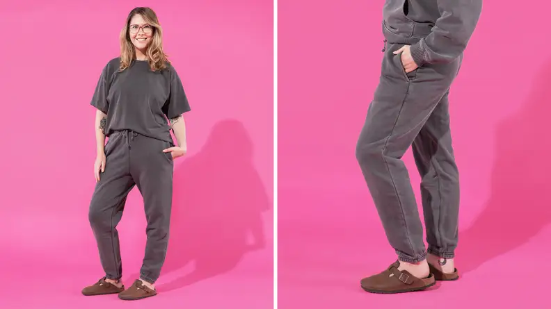 The author is seen in the Elwood Core Tee and Sweatpant in shades of gray.