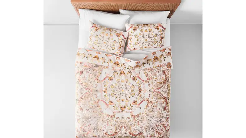 A comforter in a happy pattern will cheer you up and keep you warm