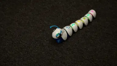 The Code-a-Pillar moves around on the ground.