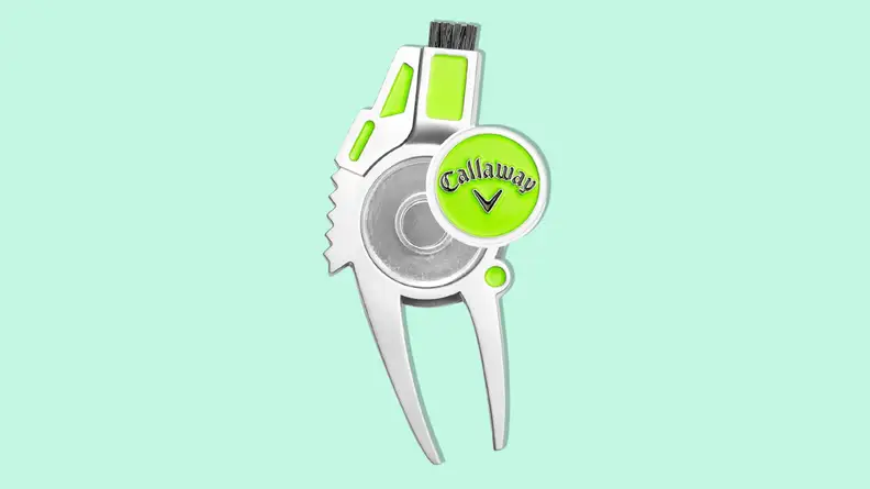 Callaway 4-in-1 golf divot repair tool on a light green background.