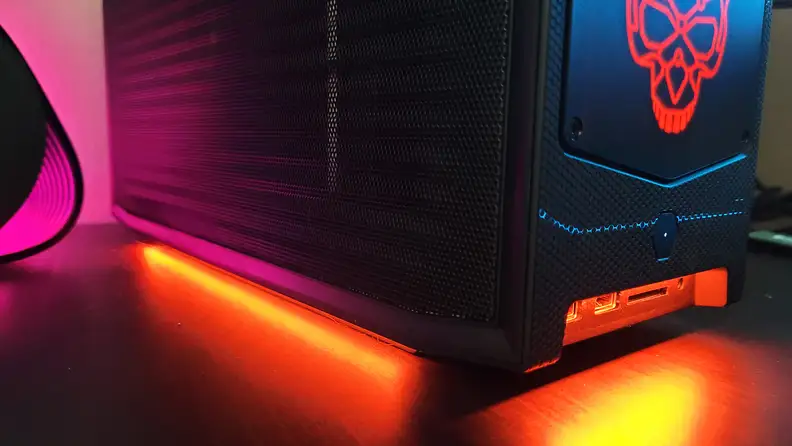 An orange glow coming from the side of a desktop PC.