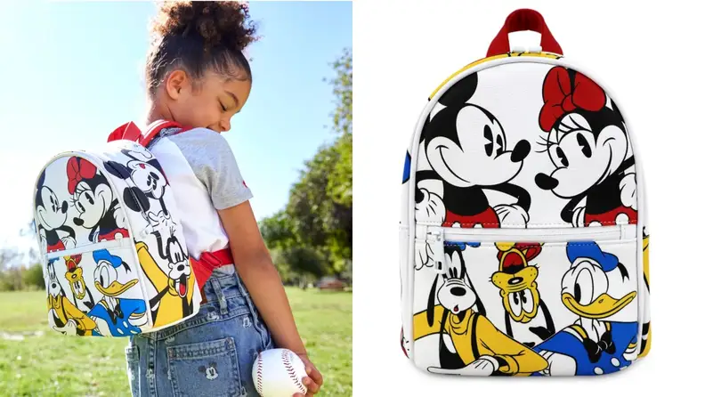 A child in a Disney-themed backpack