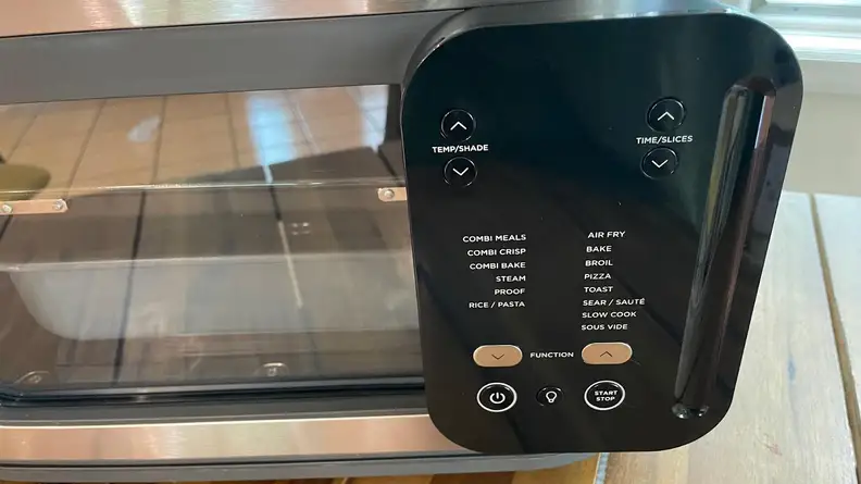 A close-up view of the settings menu on the Ninja Combi All-in-One Multicooker.