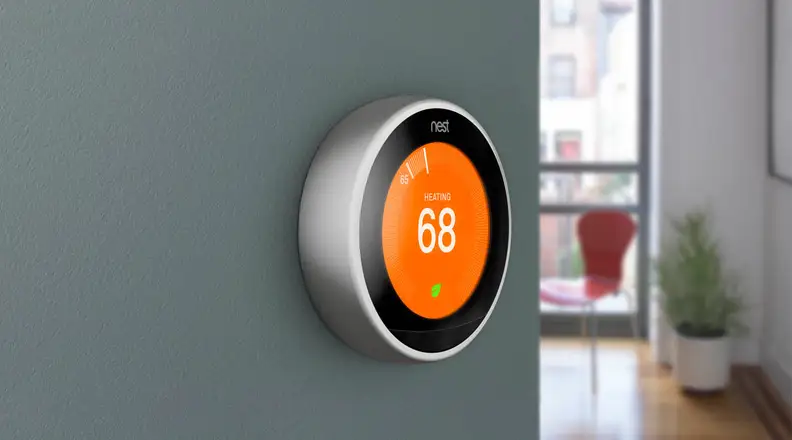 Nest thermostat on wall