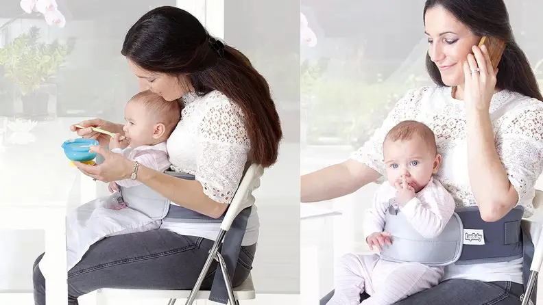 A parent securely holds their child with a LapBaby.