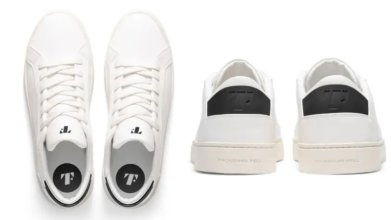Pair of Thousand Fell Lace Up sneakers with black accents.
