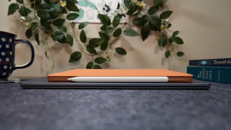 An iPad Air 4 stacked on the Surface Laptop 4 for comparison