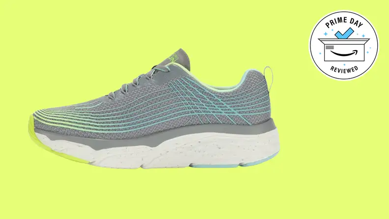 Gray sneakers with light blue lines on it.