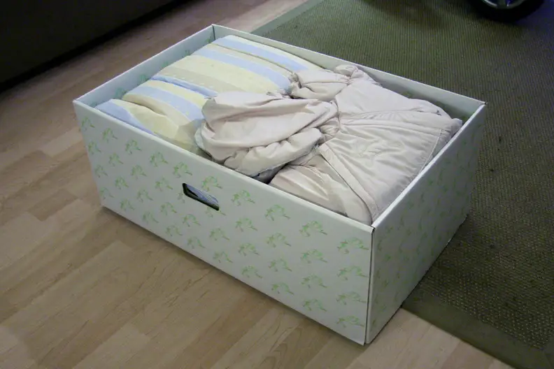 The box itself comes equipped with a waterproof mattress and doubles as a temporary crib.