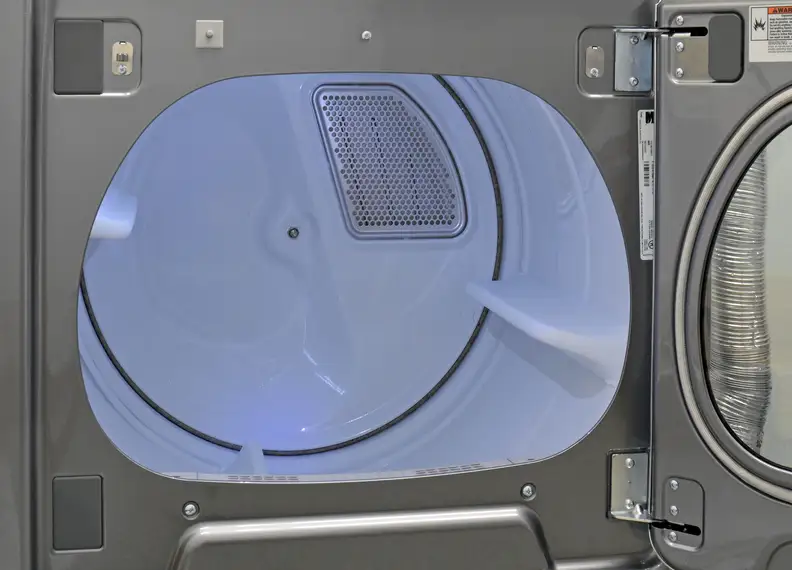 The Kenmore 69133's drum may not be stainless, but it does include a bright LED that makes it easy to see inside. No more laundry gremlins!