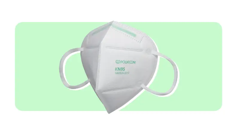 A Powecom face mask in the color white on a green and white background.