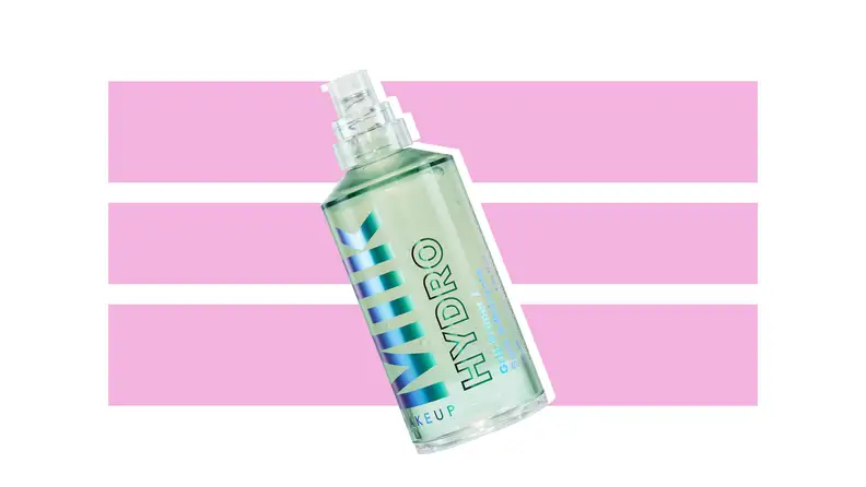 Milk Makeup primer against a pink and white background.