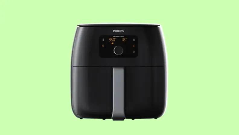 Phillips air fryer on a light green background