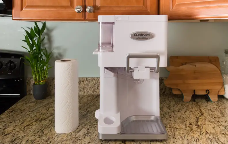 Look at how tall this thing is compared to a roll of paper towels! It doesn't even fit under my cabinets.