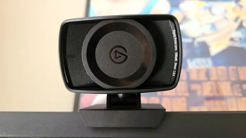 A straight on view of a webcam with a lens cover