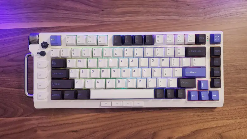 The Nuphy Field75 keyboard on a wood table.